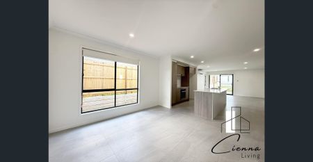 Spacious 4-Bedroom, 2-Bathroom House - Photo 2