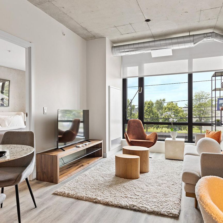 • Comfortable & Convenient Living Near Algonquin College • Spacious Suites & Amenities in Prime Centrepointe Locati - Photo 1