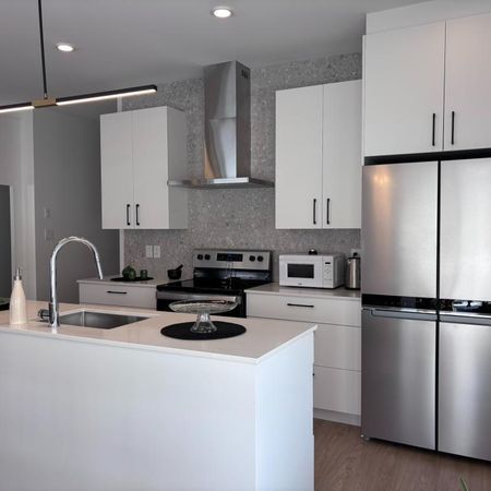 **Disponible Avril 2026** 2 chambres à coucher 2 salle de bain Appartement 4 1/2 spacieux - Photo 3