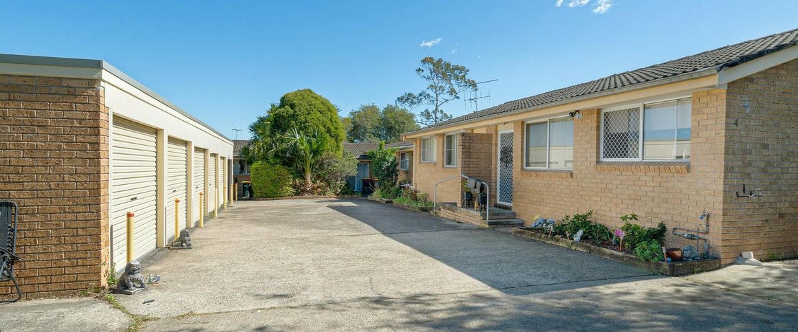 This well-presented brick unit - Photo 1