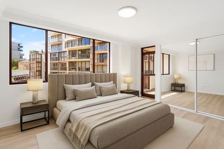 Stylish Renovated Apartment with Wrap-Around Balcony - Photo 5