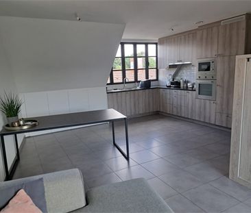 Een gunstig gelegen en mooi afgewerkt appartement - Photo 5