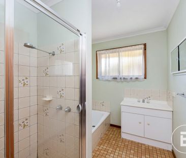 RENOVATED EASY CARE UNIT, CLOSE TO THE UNIVERSITY - Photo 1