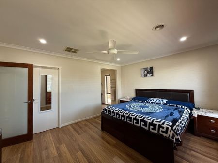 Spacious 4-Bedroom Home with Two Living Areas and Modern Upgrades - Photo 5