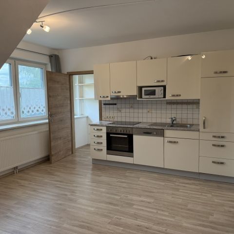 DACHGESCHOSSWOHNUNG MIT GEMEINSCHAFTSGARTEN IN AUSGEZEICHNETER WOHNLAGE - Photo 1