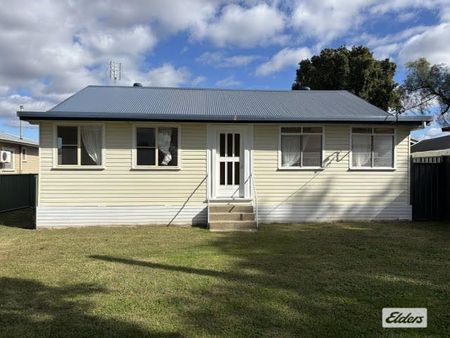 Long-Term 2-Bedroom Rental with Secure Fenced Yard - Photo 4