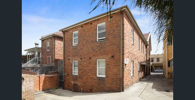 Conveniently Located Apartment with Parking - Photo 1