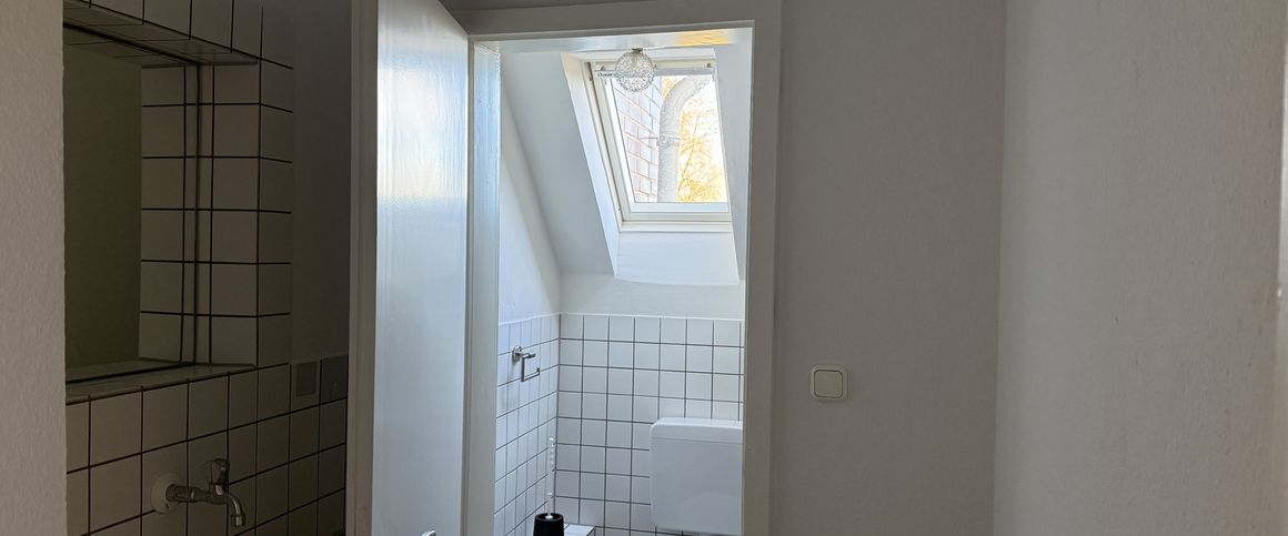 Wohnen mit Blick auf das Bismarckviertel – charmante 3-Zimmer-Dachgeschosswohnung! - Foto 1