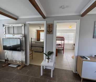 Live the Coastal Lifestyle – Furnished 4-Bedroom Retreat Steps from... - Photo 3