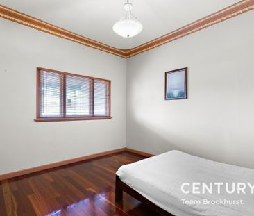 Charming 1950s Home with Modern Flexibility & Pristine Gardens! - Photo 5