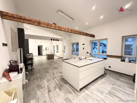 Exklusive Loft-Dachgeschosswohnung mit Balkon, Einbauküche und zwei Bädern in zentraler Hanauer Lage - Photo 4