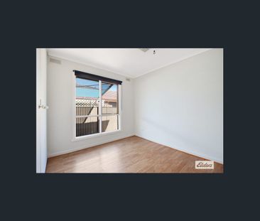 Charming 4-Bed, 2-Bath Home with Modern Upgrades & Spacious Backyard - Photo 3