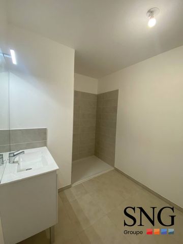 T3 AVEC LOGGIA + PARKINGS - Photo 4