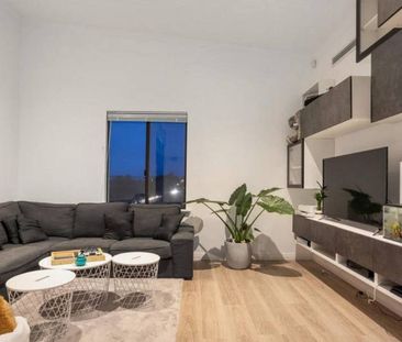 High Ceilings, a Private Balcony and Plenty of Natural Light - Photo 2