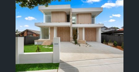Architecturally designed Family home. North facing yard with private pool - Photo 5