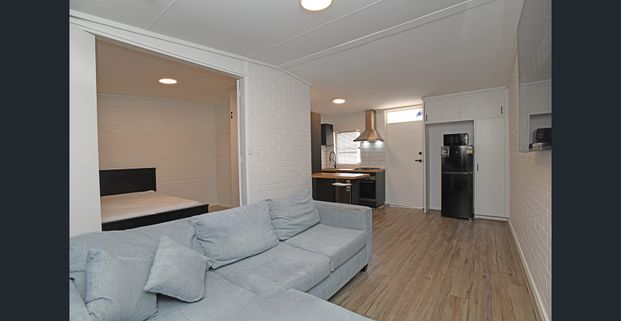 MODERN FURNISHED APARTMENT IN GREAT LOCATION - Photo 1