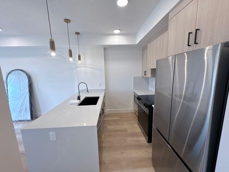 BRAND NEW! 1 Bedroom + Den Condo Unit in University District - Photo 3