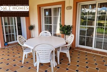 FULLY FURNISHED FRONTLINE GOLF APARTMENT WITH LARGE TERRACE BEAUTIFUL VIEWS - POOL AND A GARAGE