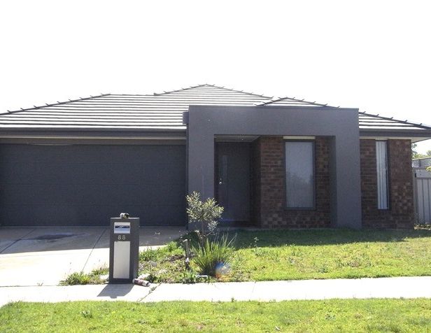 FOUR BEDROOM HOME THAT LOOKS LIKE NEW - Photo 1