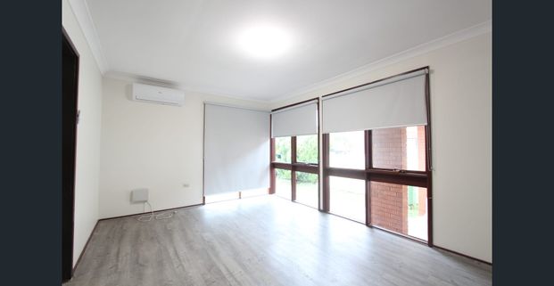 IMMACULATE FRESHLY PAINTED 3 BEDROOM BRICK HOME - Photo 1