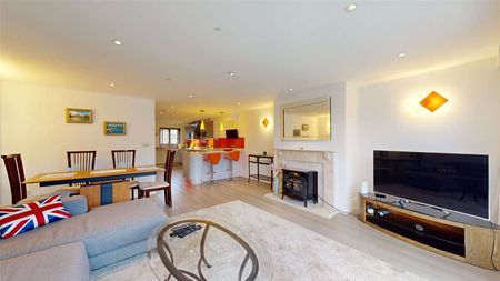 A bright and spacious home offering versatile living accommodation arranged over three floors, and enjoying unrivalled views across the River Thames to Windsor Castle. - Photo 2