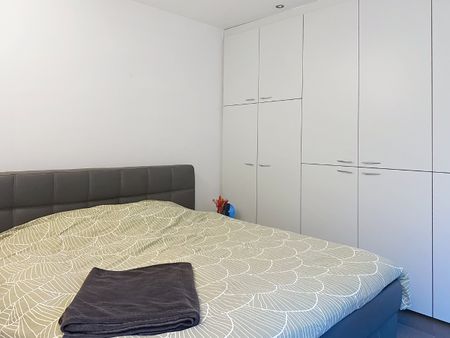 Modern één slaapkamer appartement met grote tuin en garage - Photo 5