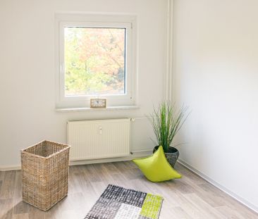 Familienfreundliche 3-Raum-Wohnung mit Einbauküche - Photo 6