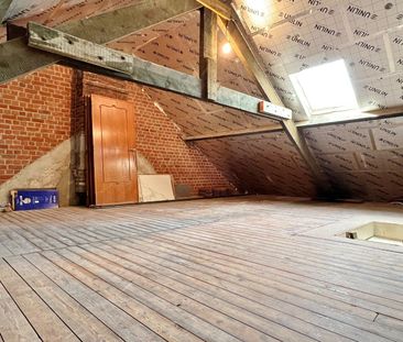 Vernieuwde rijwoning met 2 slaapkamers, zonnige tuin en garage - Photo 4