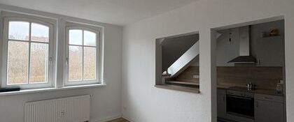 Zentral gelegene Dachgeschosswohnung mit Einbauküche in Zwickau - Photo 1