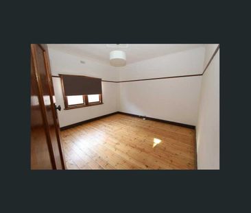 Charming 3-Bedroom Home with Classic Appeal in Prime Location - Photo 1