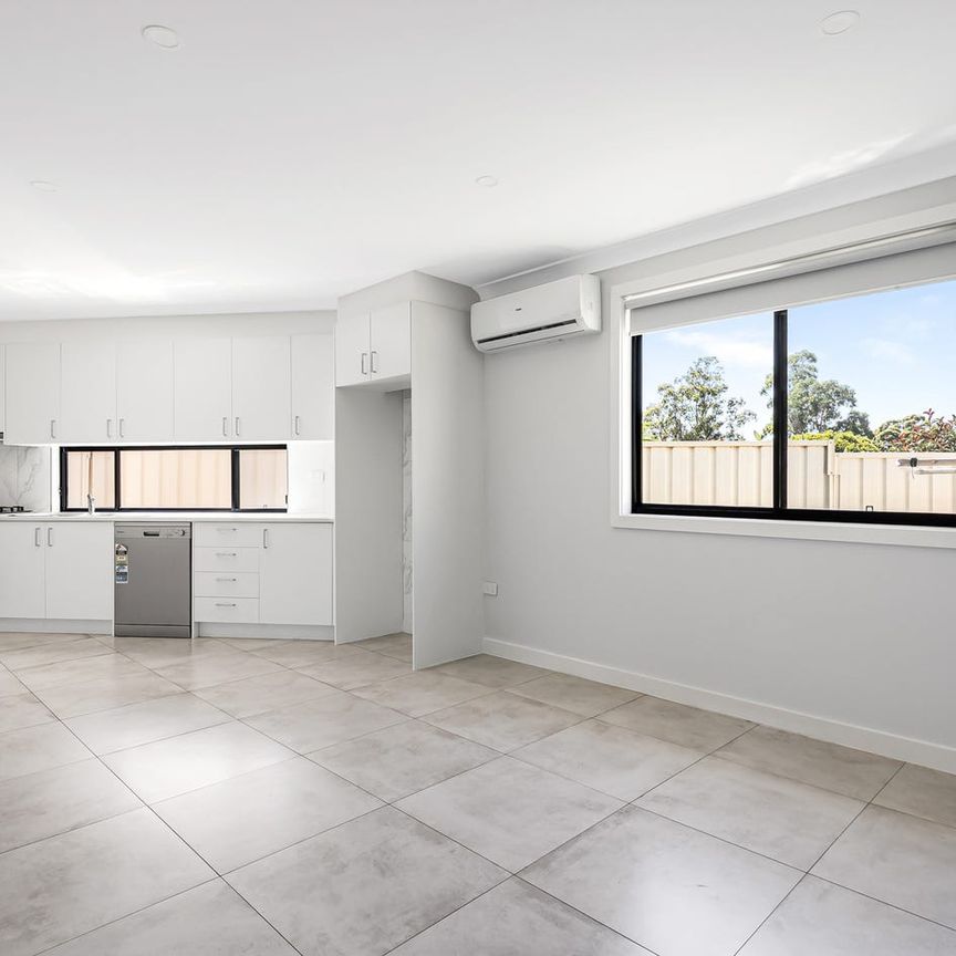 Step into comfort and modern living! - Photo 1