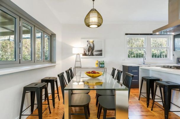 Beautifully Renovated Two-Bedroom Semi in Ultra-Convenient Location - Photo 1
