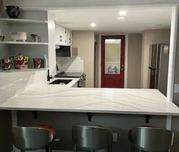 1 Bedroom plus den basement suite | 149 Hodson Crescent, Okotoks - Photo 1