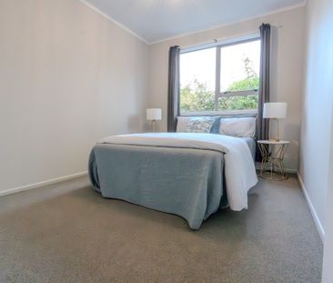 This newly renovated 2-bedroom unit offers modern, low-maintenance ... - Photo 1