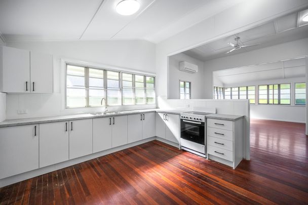 Queenslander Lifestyle Just Two Streets from the Strand - Photo 1