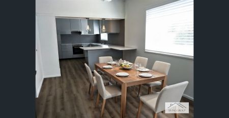 Three Bedroom Spacious Unit - Photo 2