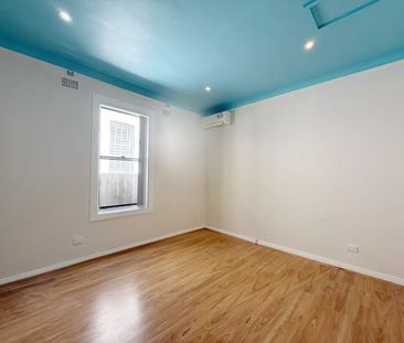 Expansive 4-Bedroom Family Home with Detached Studio - Photo 5