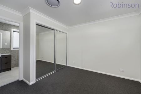 Brand new three bedroom townhouse with ducted air conditioning - Photo 4