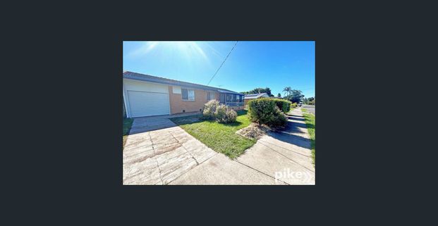 Lovely Home with Sunroom - Photo 1
