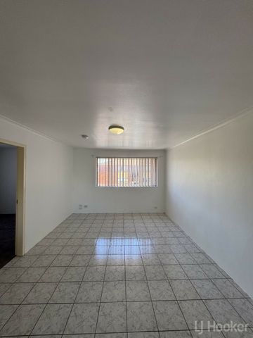 Two Bedroom Top Floor Unit - Photo 3