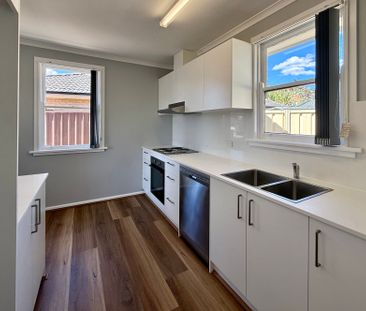 Freshly Renovated Throughout | Prime Location & Brand New Appliances - Photo 3
