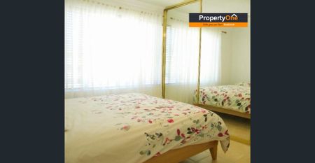 🏡 Freshly Renovated 2-Bedroom Unit with 2 Balconies & Lock-Up Garage - Photo 2