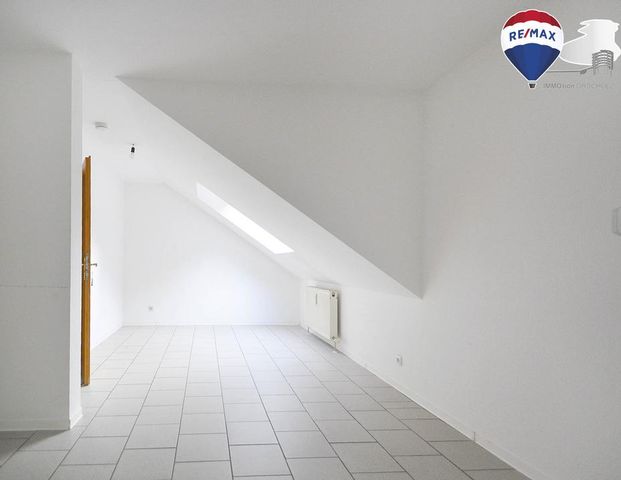 Attraktive 3-Zimmer-Dachgeschosswohnung in idyllischer Lage - Foto 1