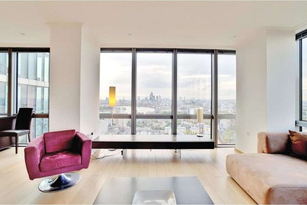 A luxury two-bedroom, two-bathroom apartment located on the 26th floor of No.1 West India Quay, E14, offering approximately 1,270 sqft of living space. - Photo 1