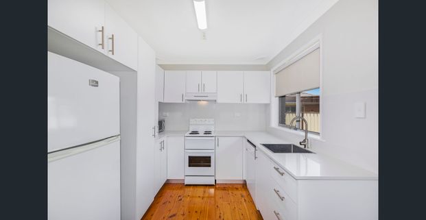 Immaculately Presented Beachside Cottage - Photo 1