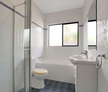 Four-Bedroom Duplex Close to Beach - Photo 6