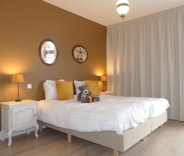 Ruim instapklaar en gezellig gelijkvloersappartement met terras en ... - Foto 3