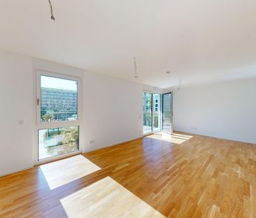 Neubau-Erstbezug: Attraktive Wohnung mit sonnigem Balkon und Erdges... - Photo 1