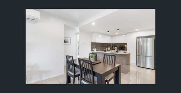 Stylish Two-Bedroom Unit with Large Courtyard - Photo 1