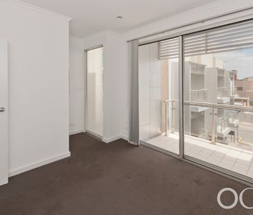 Open the Door to City Serenity with a Private Balcony - Photo 5